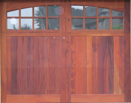 Wood Garage Door with Radius Windows and molding